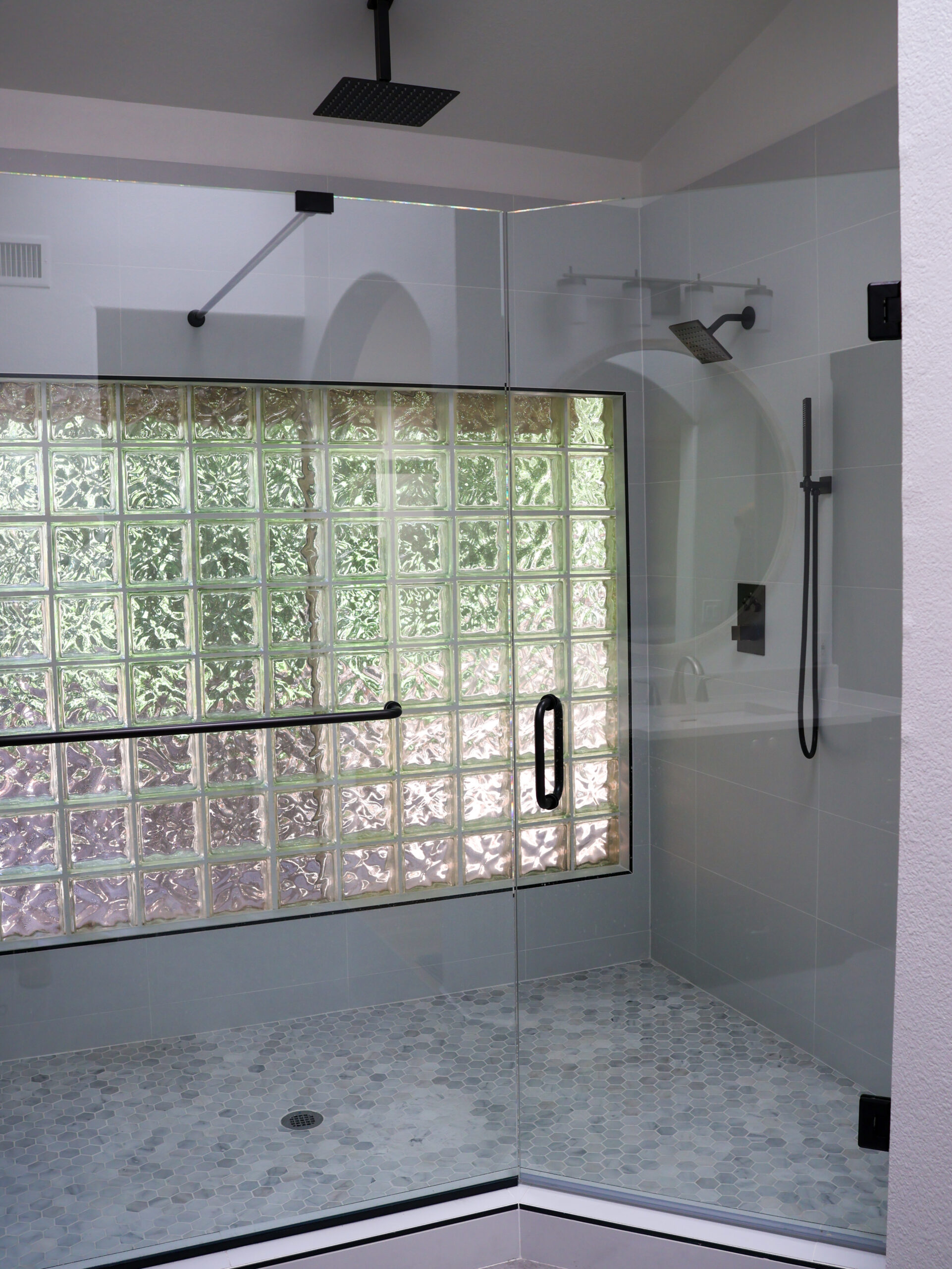 Glass block shower remodel by T26 Design Build